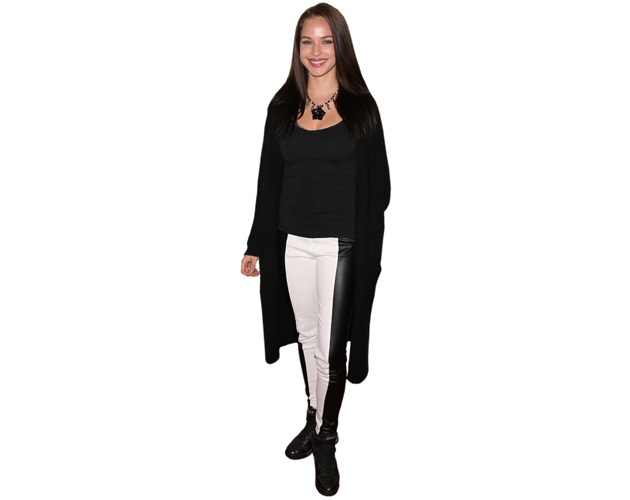 A Lifesize Cardboard Cutout of Alexis Knapp wearing trousers
