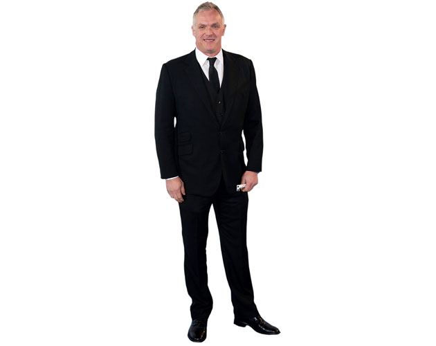A Lifesize Cardboard Cutout of Greg Davies wearing a suit