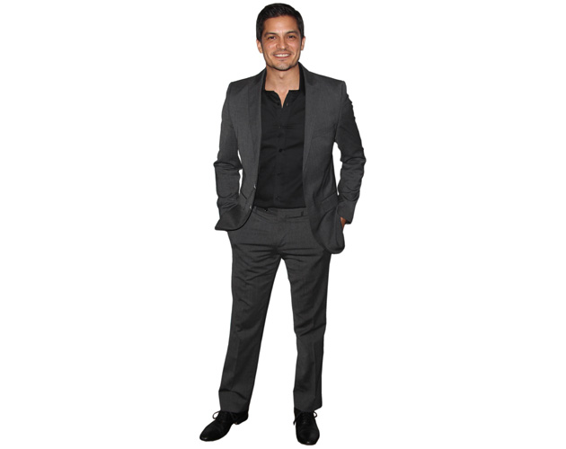 A Lifesize Cardboard Cutout of Jay Hernandez wearing a suit