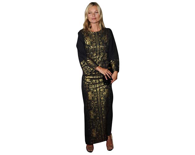 A Lifesize Cardboard Cutout of Kate Moss wearing an ethnic outfit