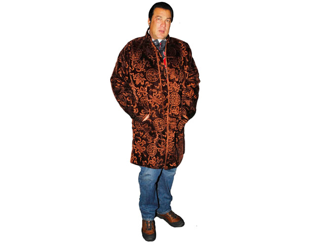 A Lifesize Cardboard Cutout of Steven Seagal wearing a coat